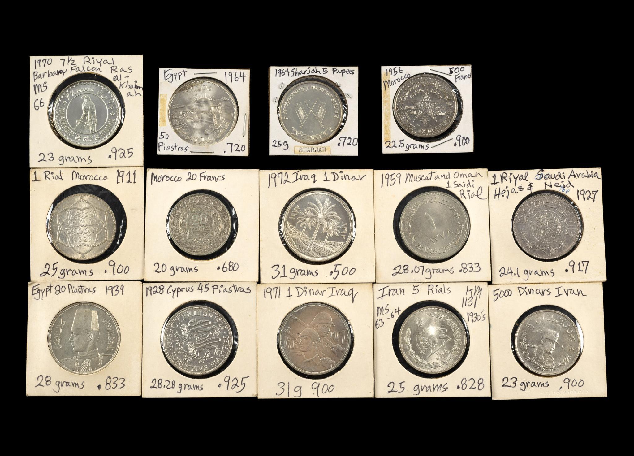 Fourteen Silver Middle Eastern Dollar Sized Coins