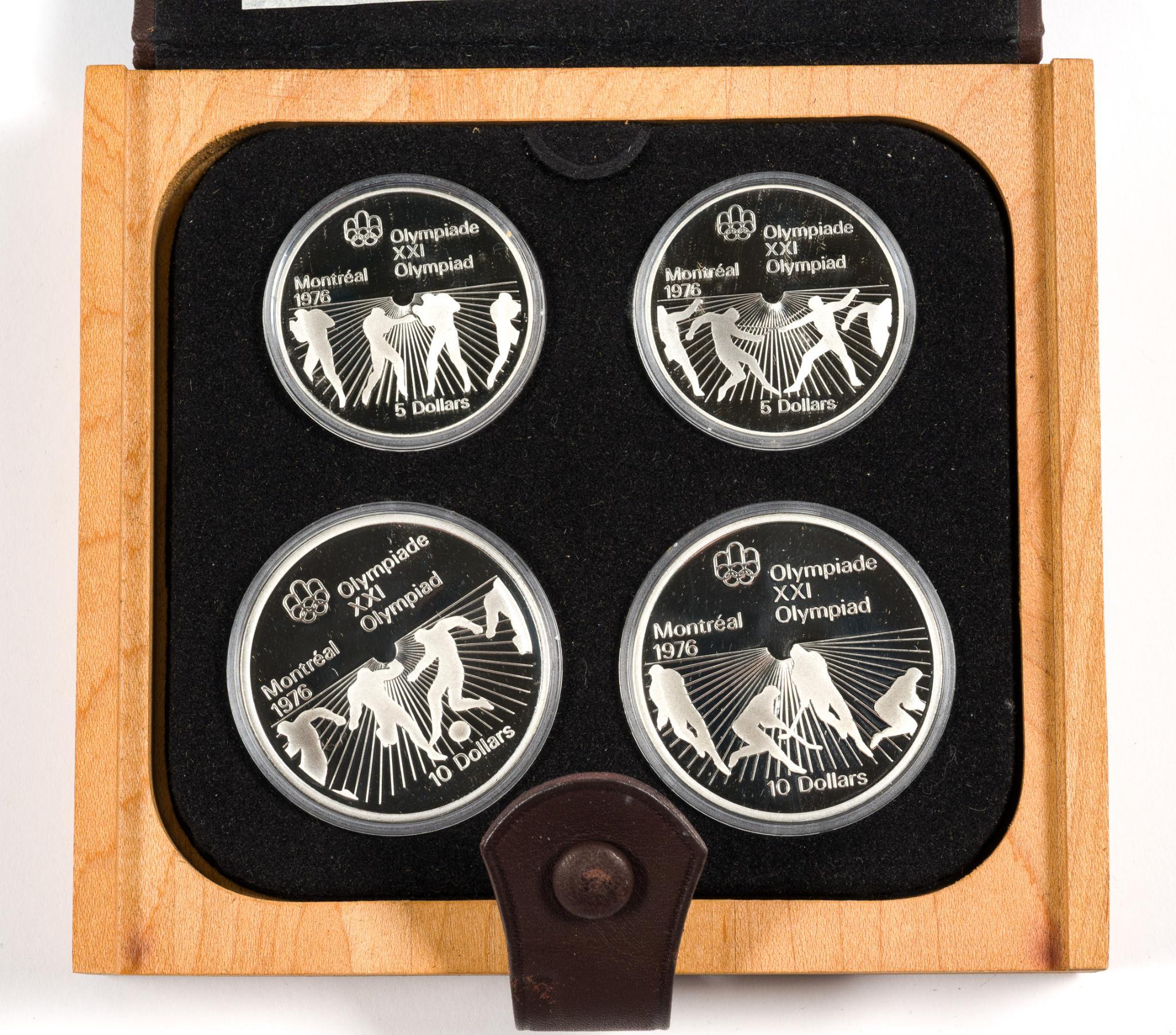 Four 1976 Montreal Olympic Silver Coin Sets