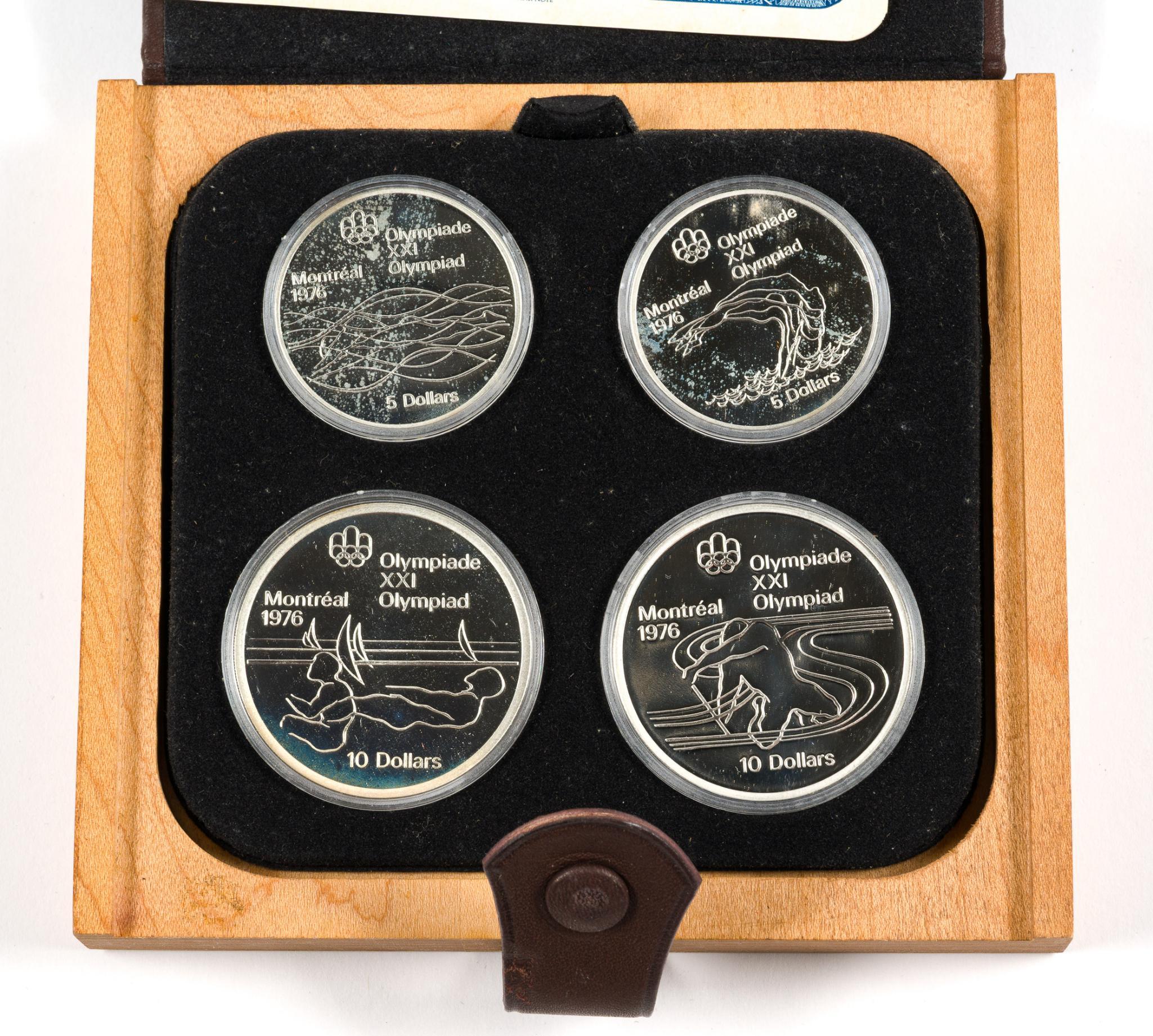 Four 1976 Montreal Olympic Silver Coin Sets