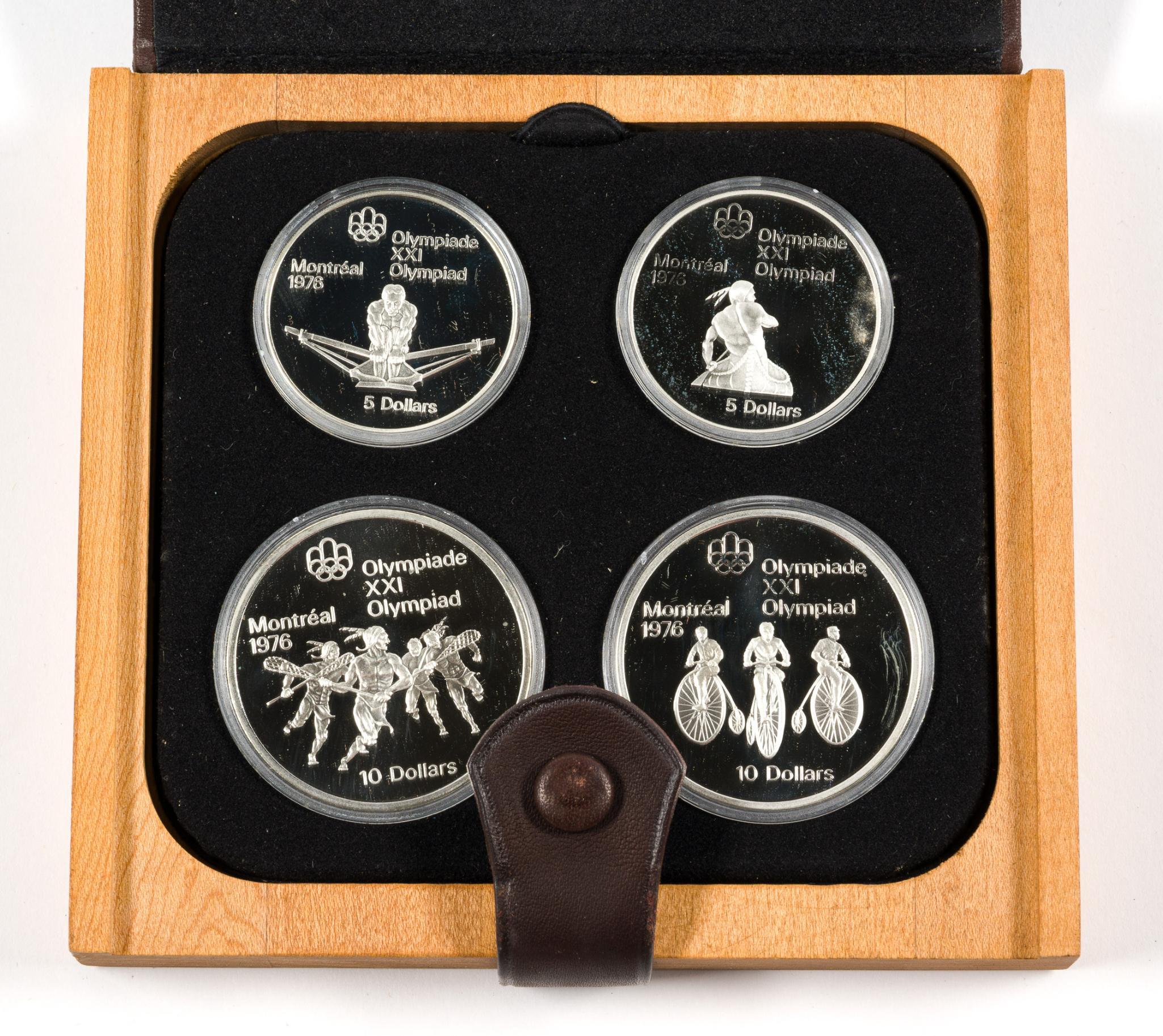 Three 1976 Montreal Olympic Silver Coin Sets