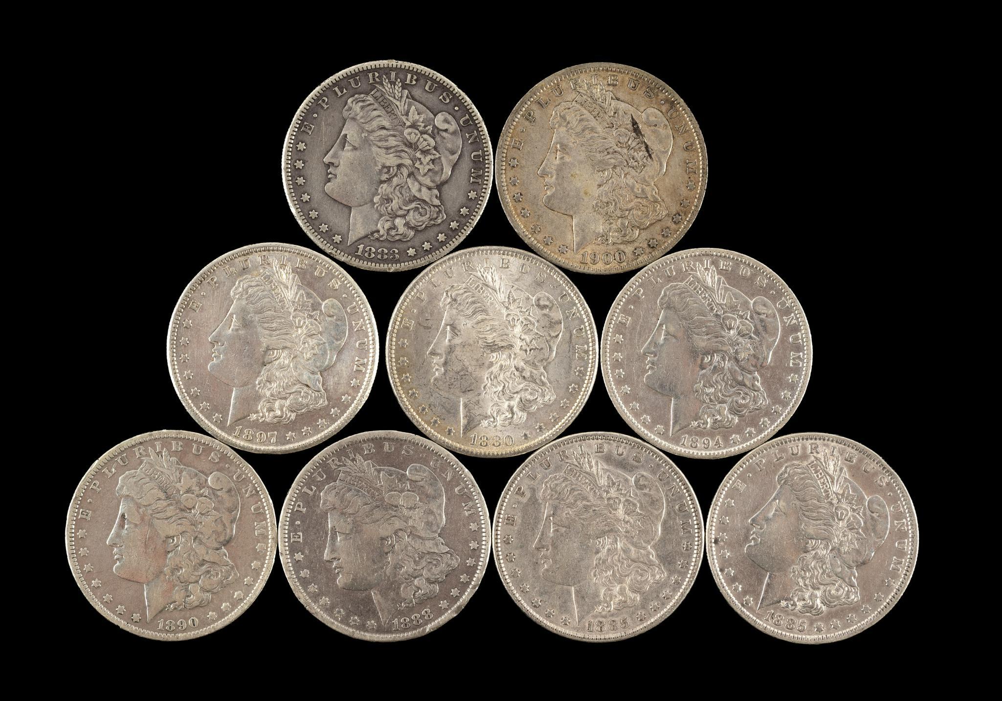 Nine Morgan Silver Dollars
