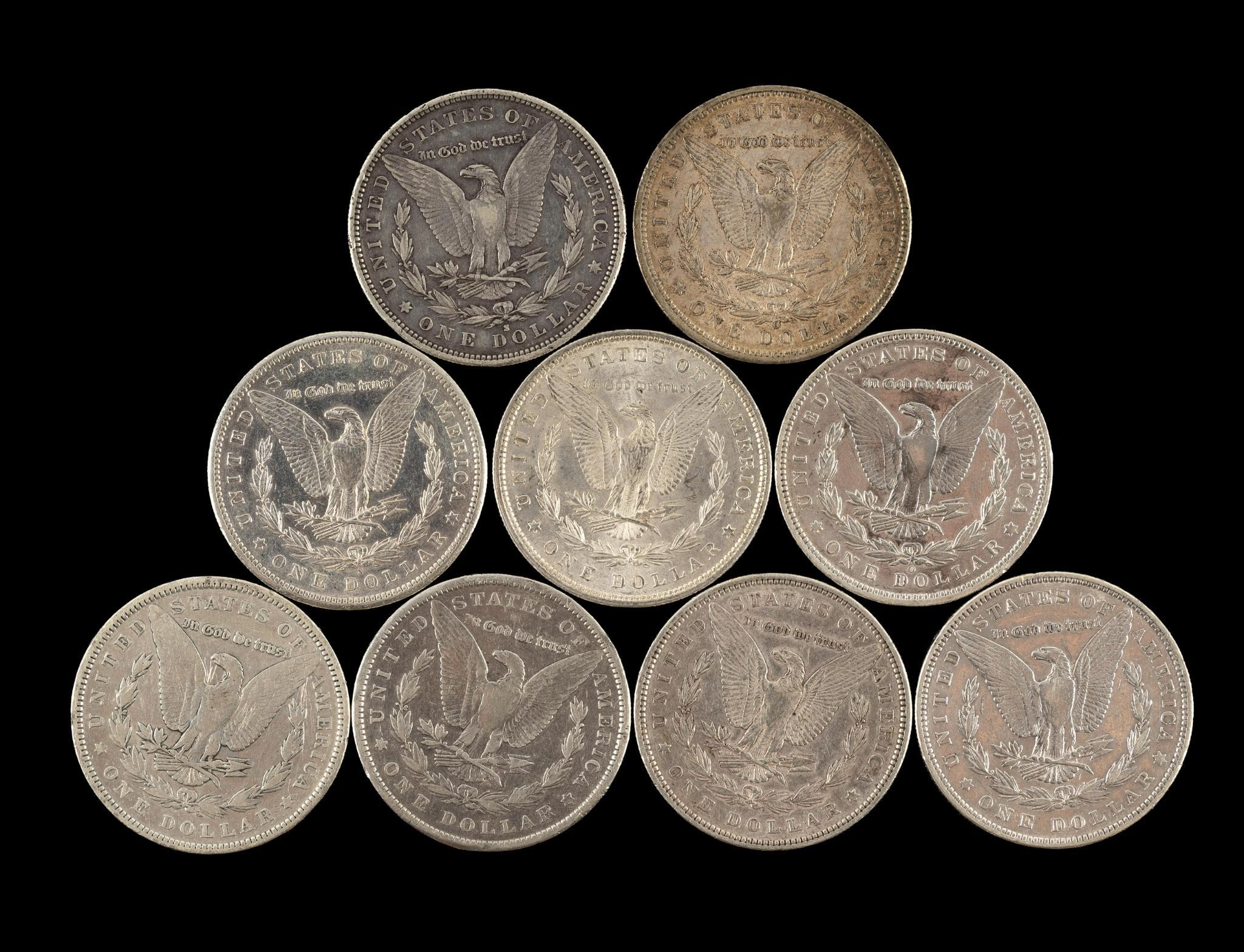 Nine Morgan Silver Dollars