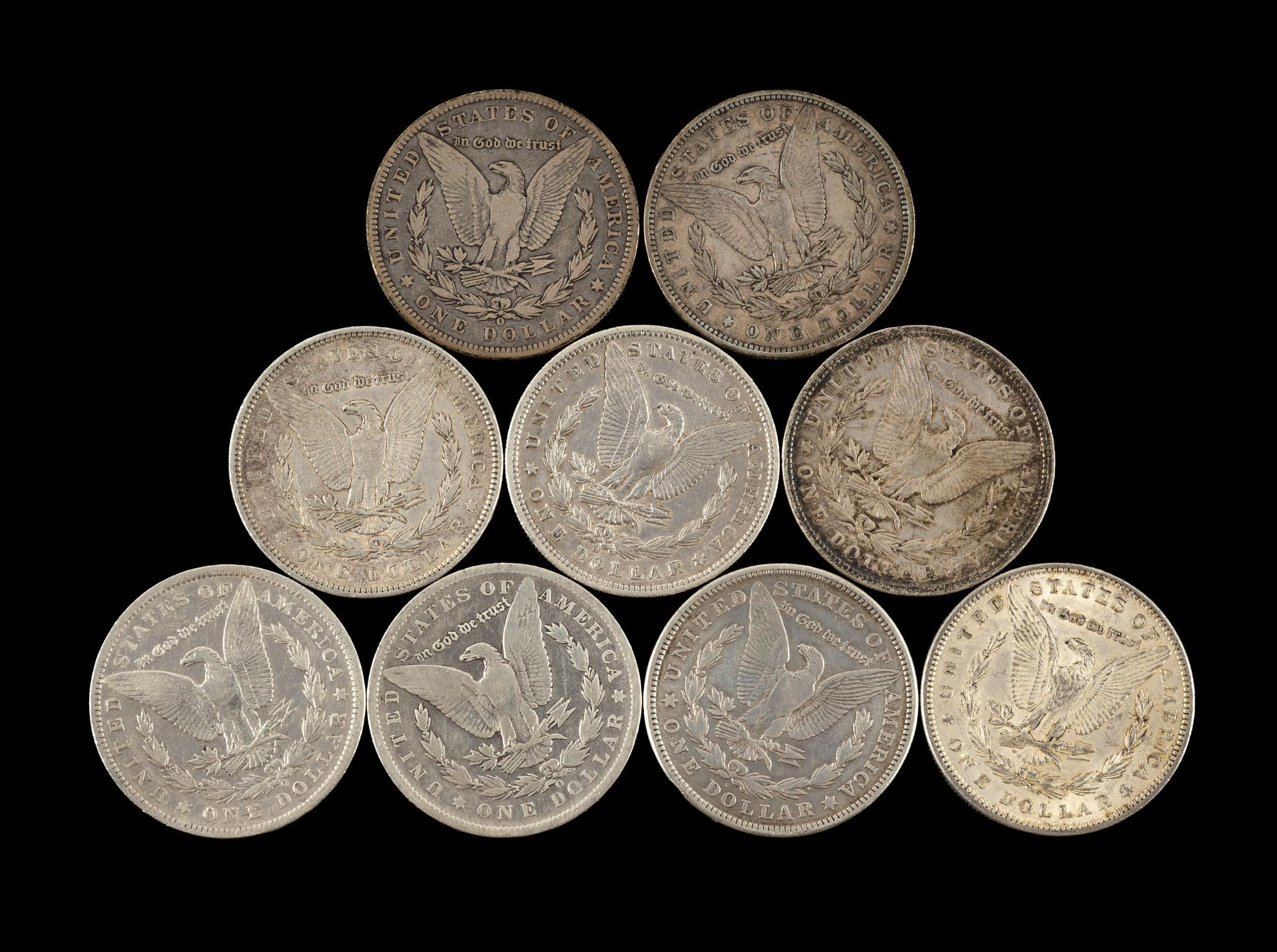 Nine Morgan Silver Dollars