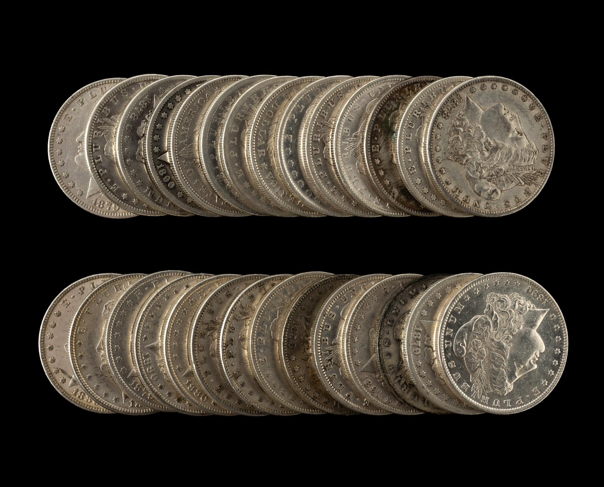Twenty Eight Morgan Silver Dollars