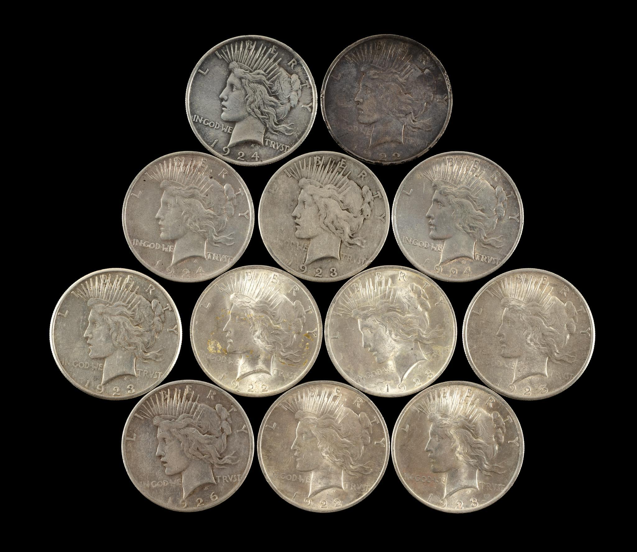Twelve Peace Silver Dollars