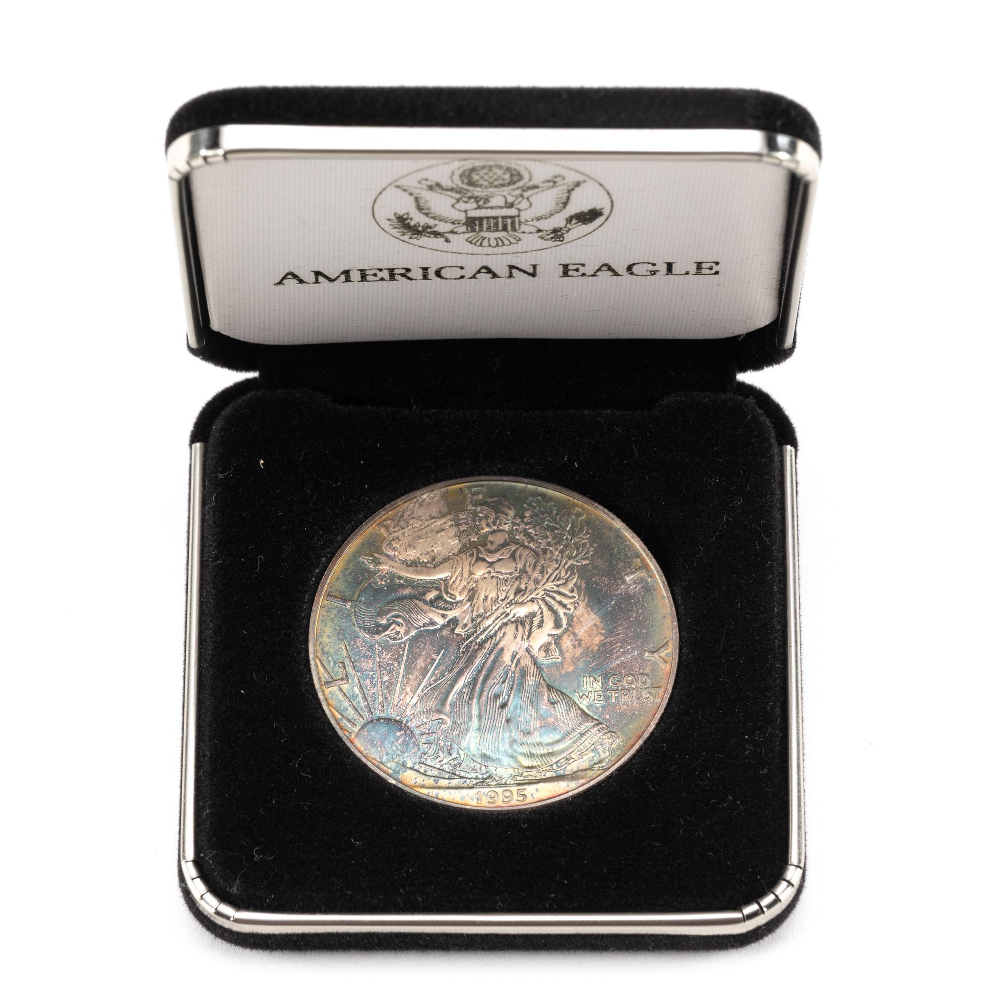 Three American Eagle Dollars