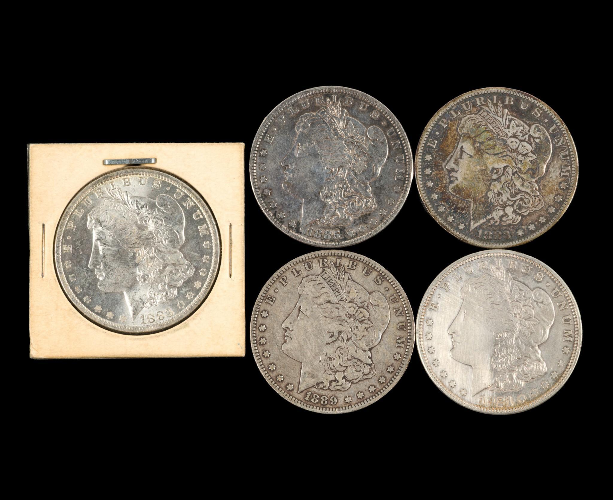 Five Morgan Silver Dollars