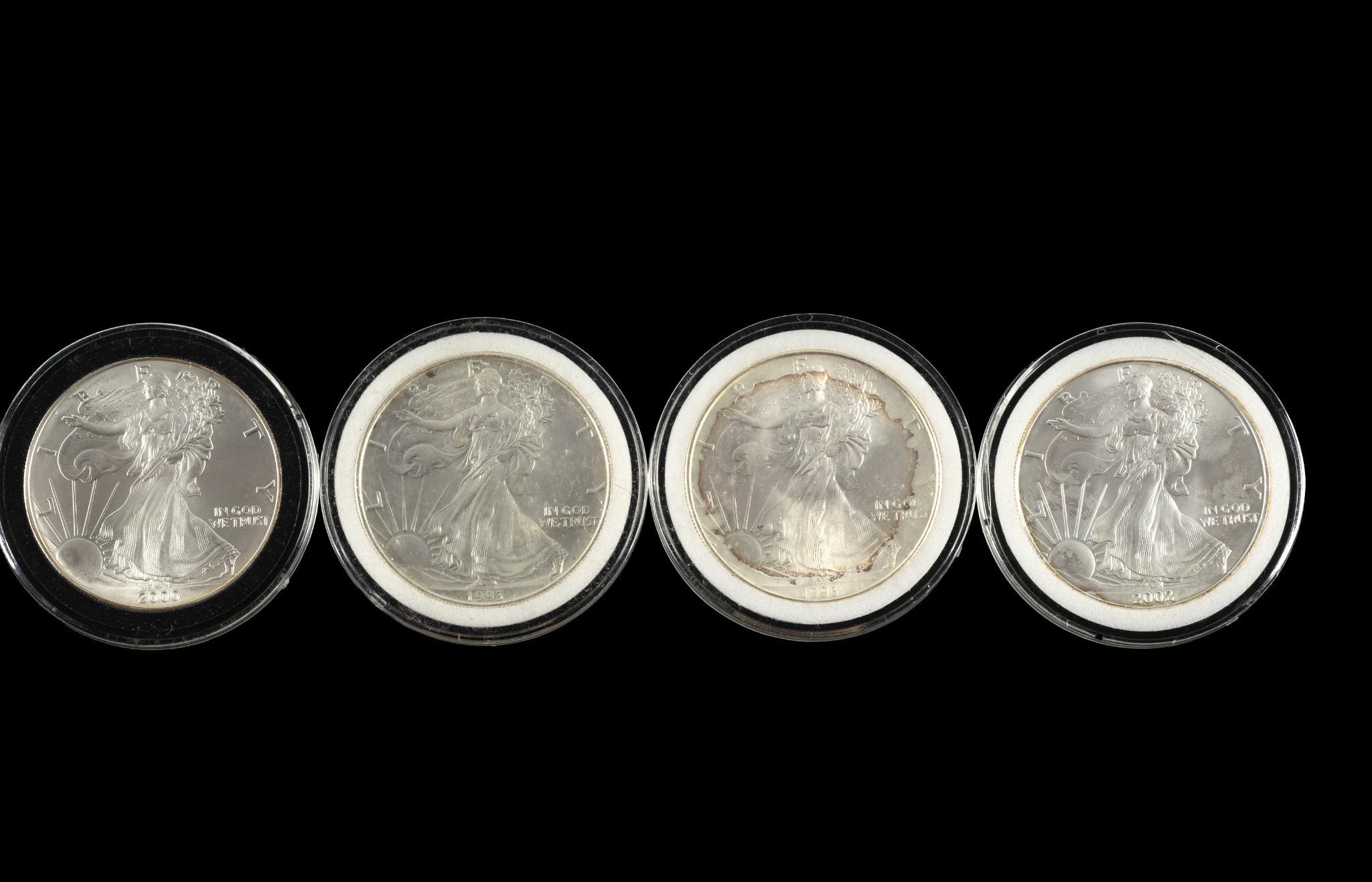 Four American Eagle Silver Dollars