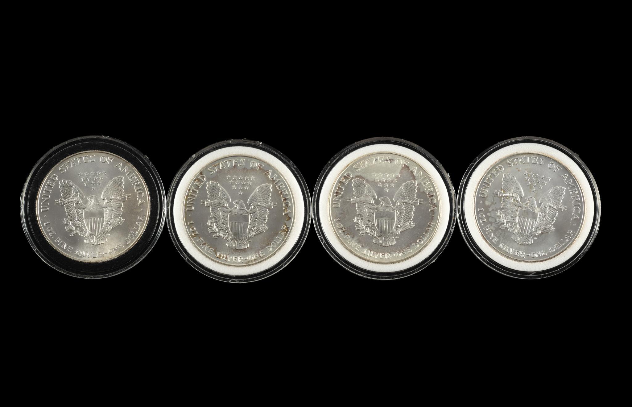 Four American Eagle Silver Dollars