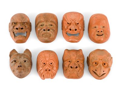 8 Japanese Miniature Pottery Netsuke. Eight miniature unglazed terracotta theatrical mask 