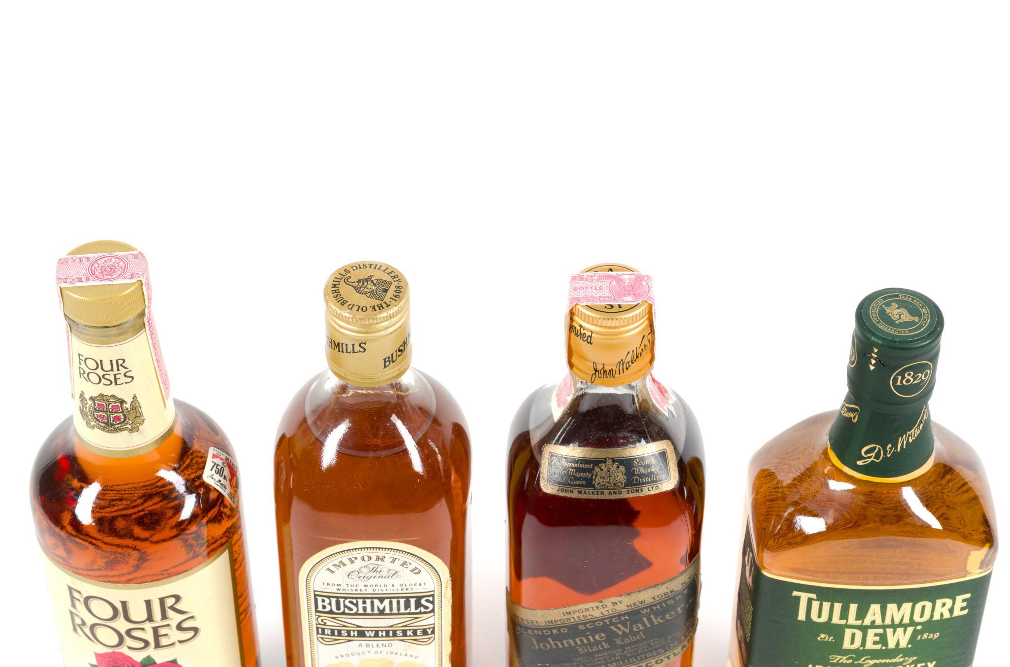 4 Bottles of Whiskey Incl. Johnnie Walker Black Label