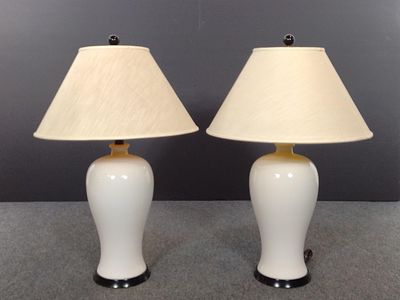 Pair of Cream Glazed Ceramic Table Lamps. Both measure 22" x 22" x 35".