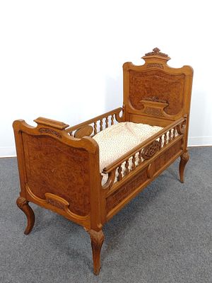 Victorian Inlaid Crib or Child's Bed. 24" wide X 45" deep X 40" high. Has a few spots of veneer loss.