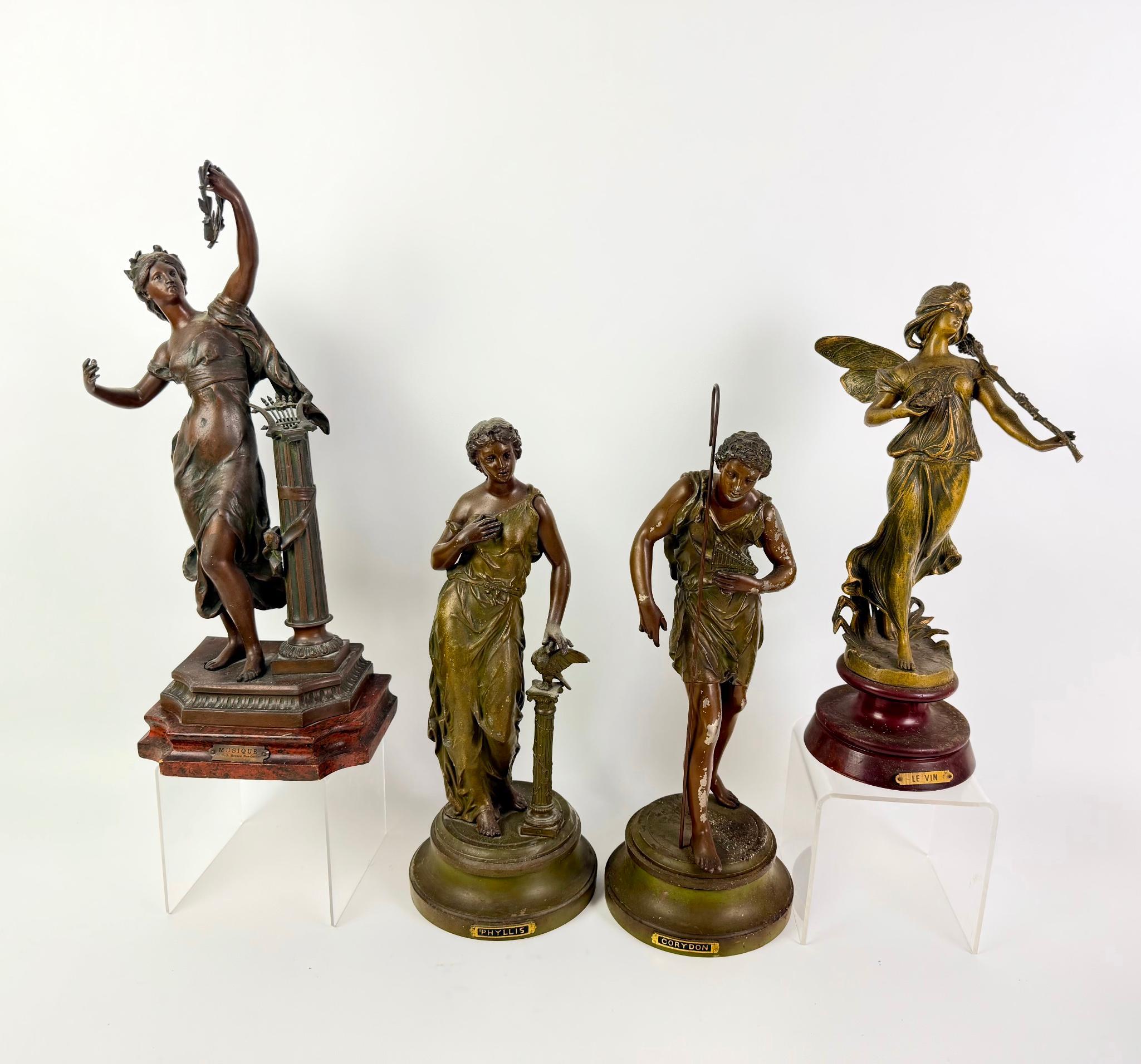 4 Spelter Metal Statues