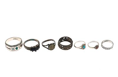 7 Sterling Silver Rings. All marked. Sizes 2 to 10.5 Total 0.67 ozt.
