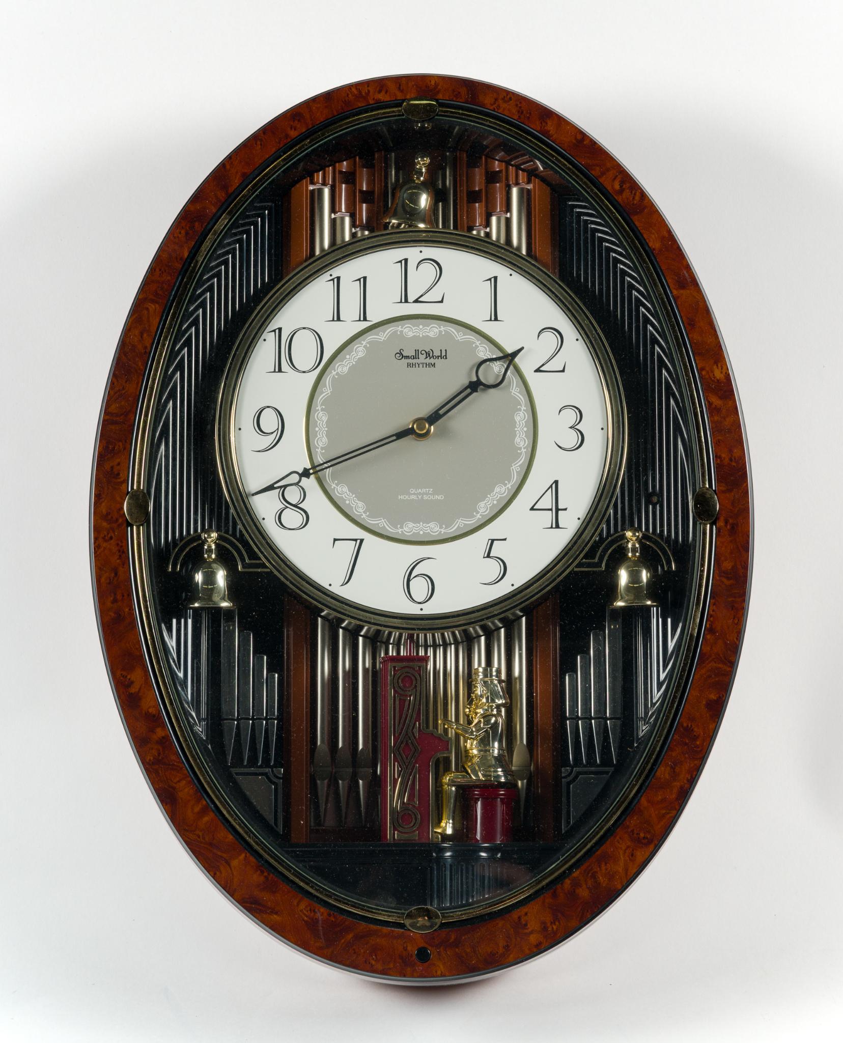 2 Wall Clocks Incl. Small World