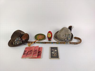 2 German Tyrolean Hats, Cane & German Cultural Pieces. All items in condition consistent with 