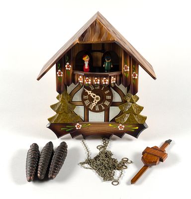 Black Forest Cuckoo Clock. Untested. Weights detached but included. Clock itself measures 10" W 