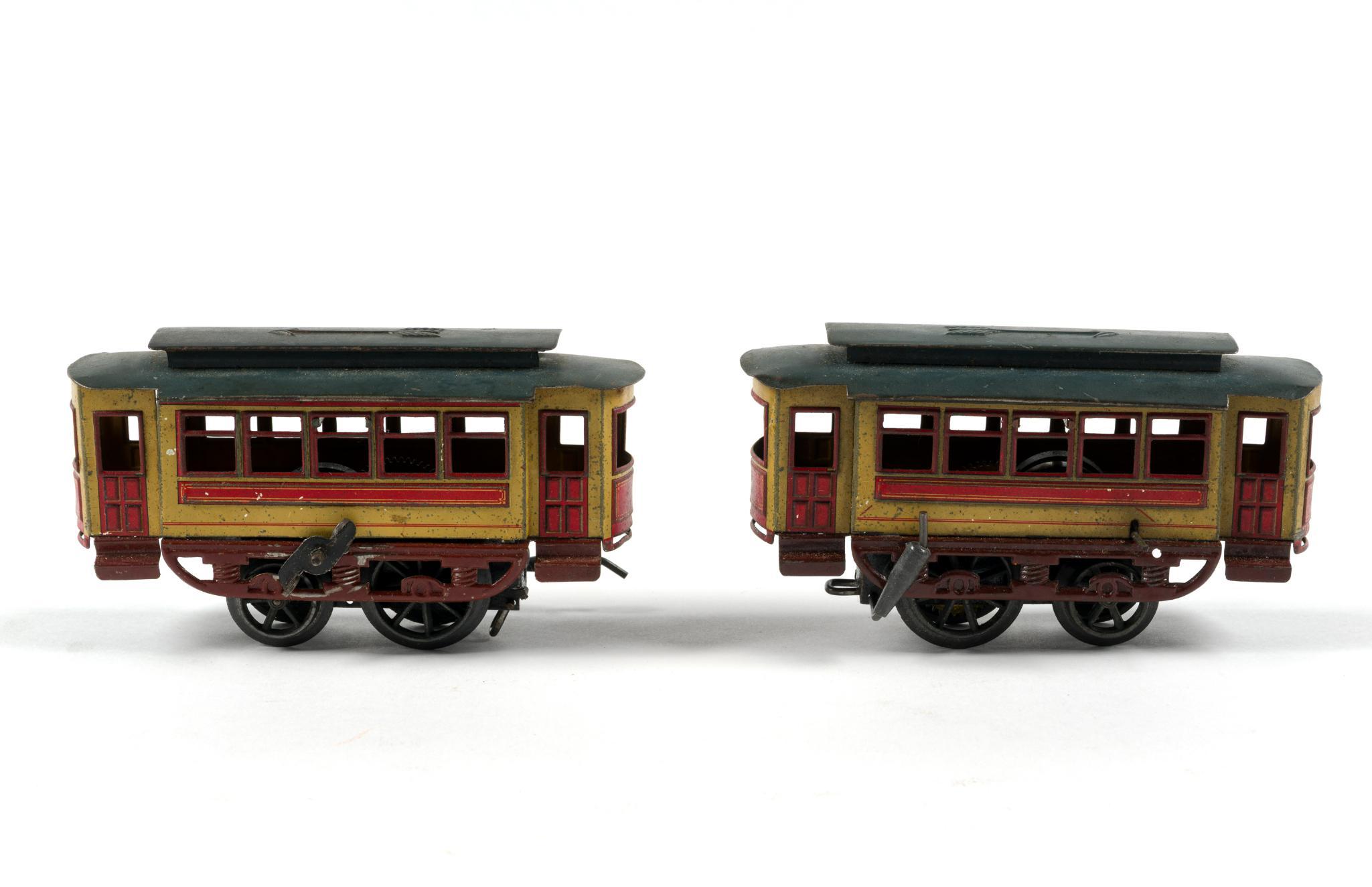 Pair Of Prewar Clockwork Trolley Cars