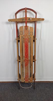 Vintage Sled. "Champion Fasttrack." Paint losses. Measures 22" W x 6" D x 59" H.