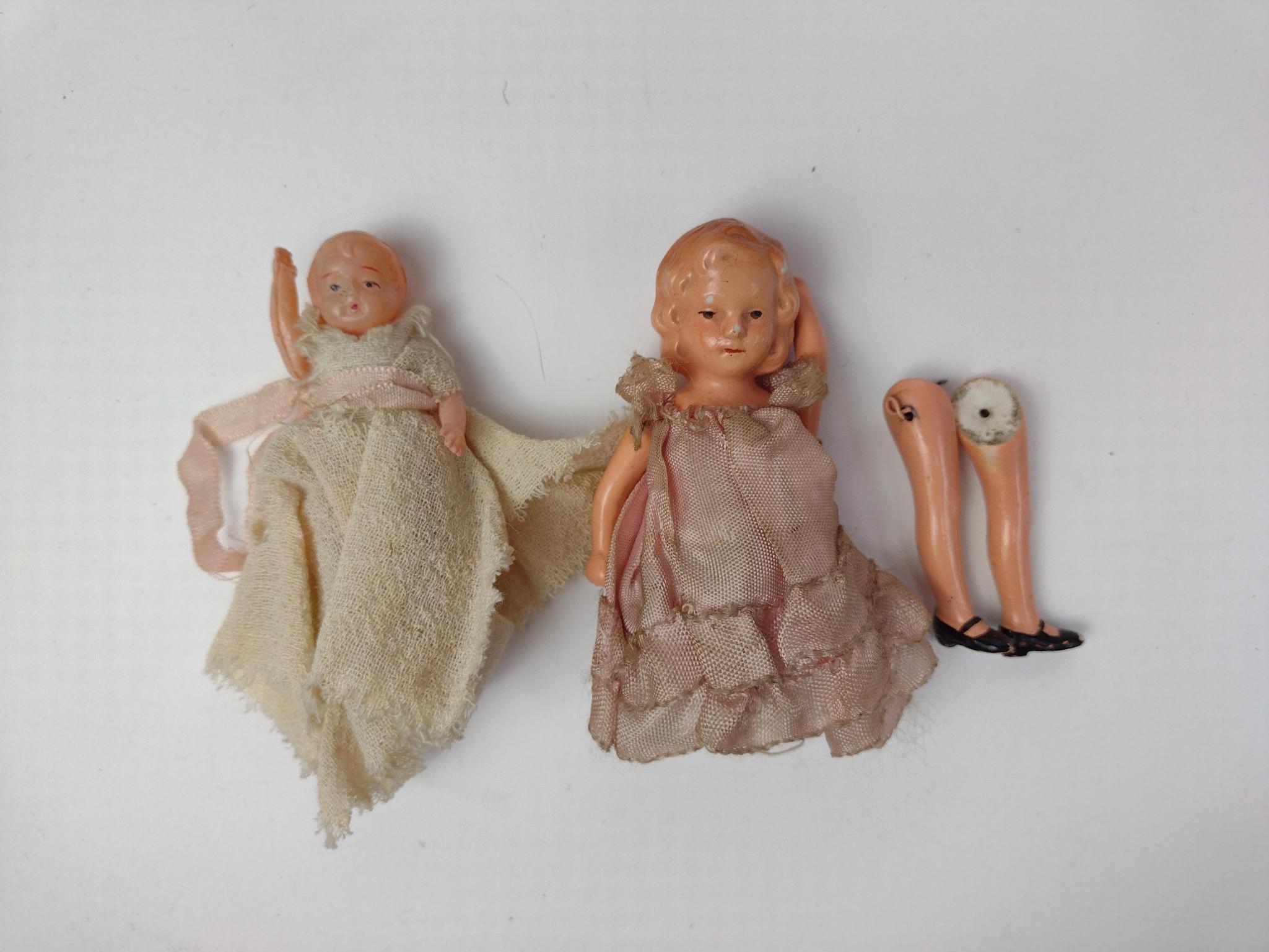 4 Miniature Dolls