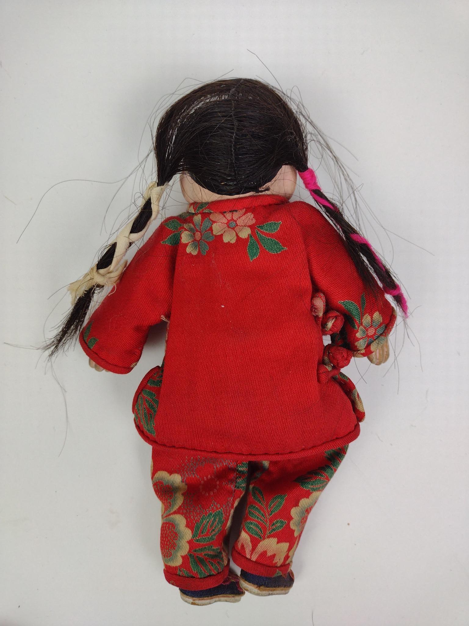 4 Miniature Dolls