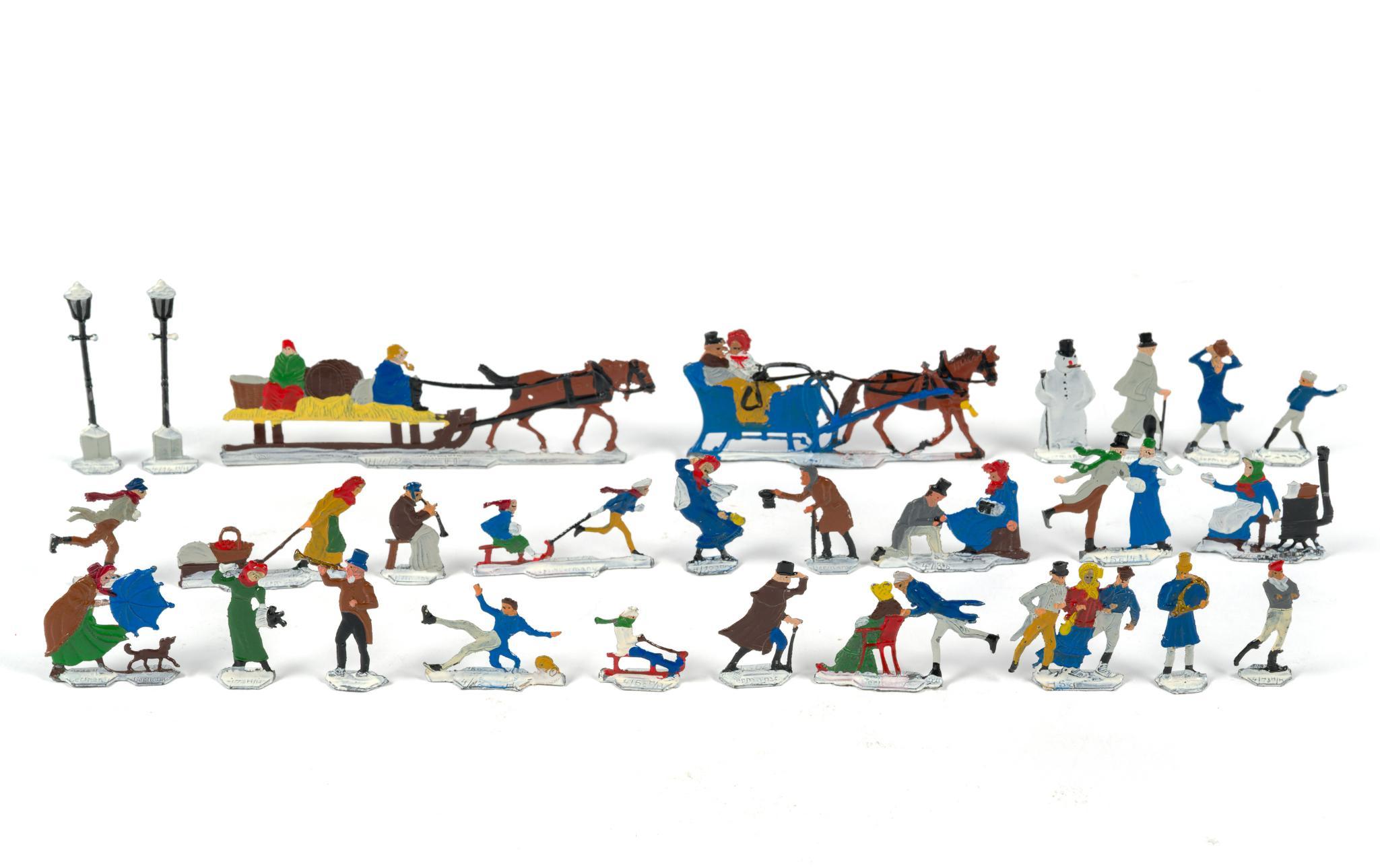 German Flat Metal Winter Skaters Figures