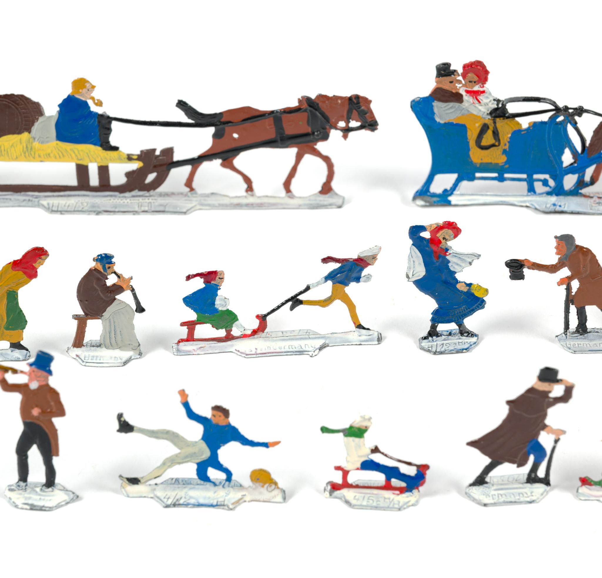 German Flat Metal Winter Skaters Figures