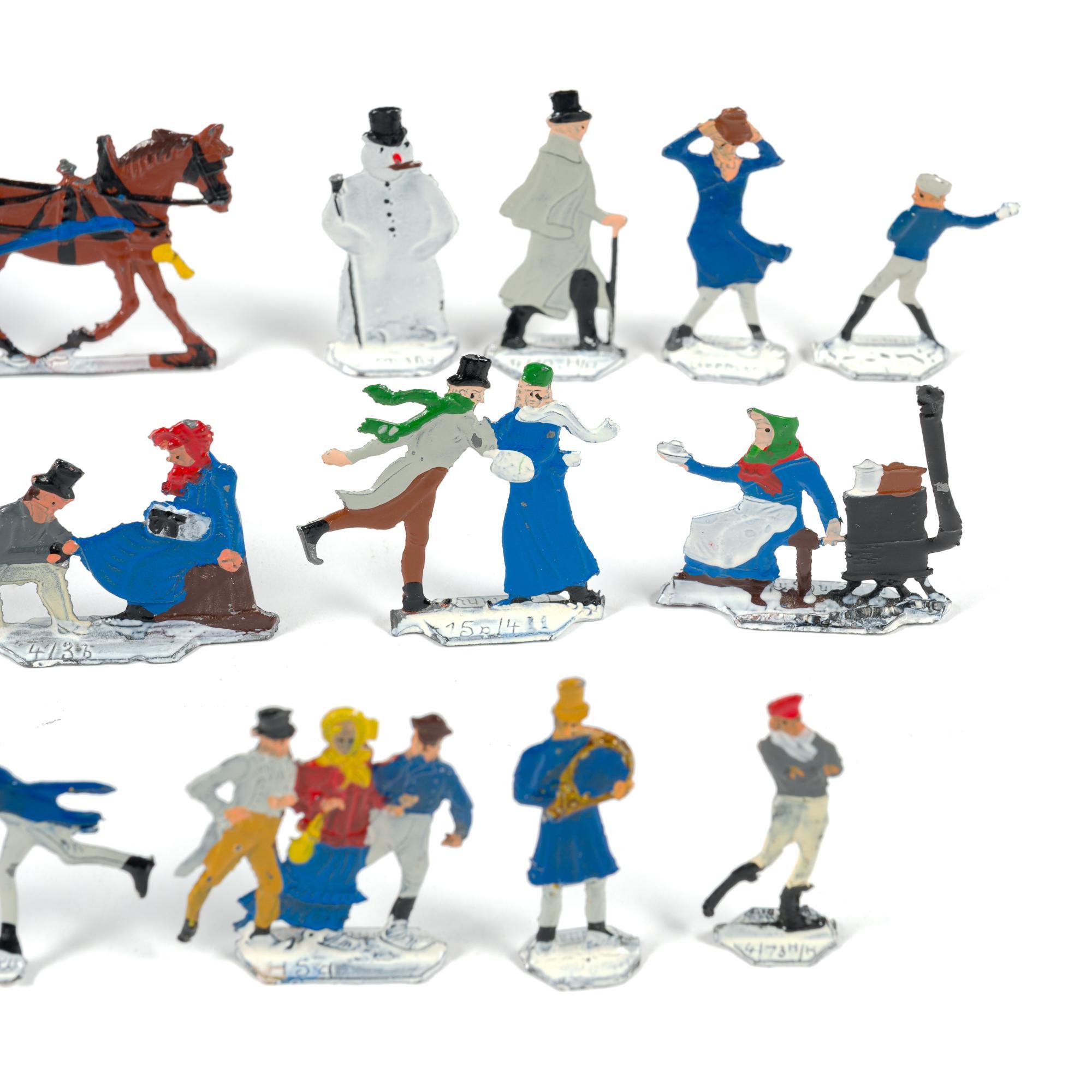 German Flat Metal Winter Skaters Figures