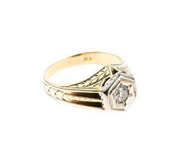 14K Gold And Diamond Ring. A size 7 antique yellow gold ring with a central diamond of 