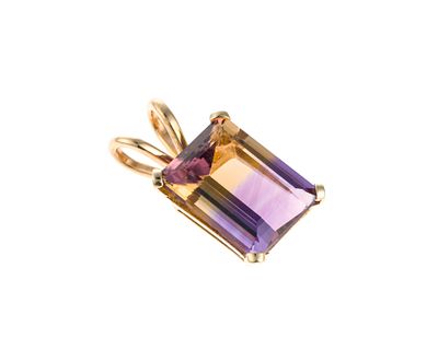 14K Gold and Ametrine Pendant. A pendant in yellow gold testing 14k with an emerald cut ametrine 