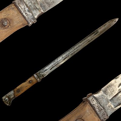 A Mauser M96 Rifle Bayonet with Wooden Grips, 1942. Item details 
Description 
A Mauser M96 