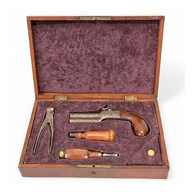 Cased Double-Barrel Superposed Percussion Traveling Pistol with Accessories, French, 19th Century. 