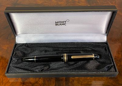 A Cased Mont Blanc No 146 With 14ct nib numbered 4810 . Presented in good oder.