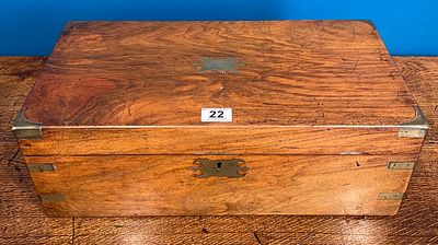 A brass bound mahogany writing slope. A brass bound Victorian mahogany campaign style writing slope.