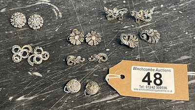 Seven Pairs Of Earrings. Severn Pairs Of Earrings With Marquisette Decoration