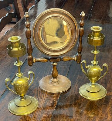 A Pair Of Brass Candlesticks And Dressing Mirror
