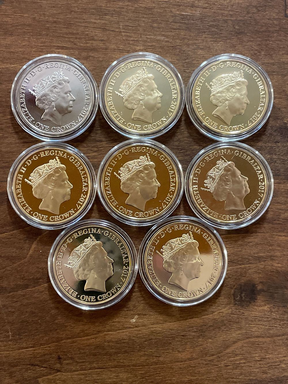 Lot 313 – A Set of Eight Gibraltar 2017 Queen Elizabeth II and Prince Philip 70th Wedding Anniversary One Crown Coins.