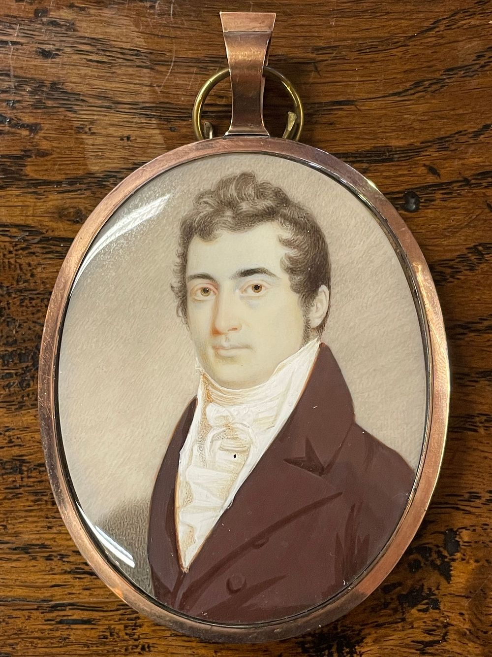 Lot 340 – A Late 18th or Early 19th Century Portrait Miniature Pendant with Mourning Reverse