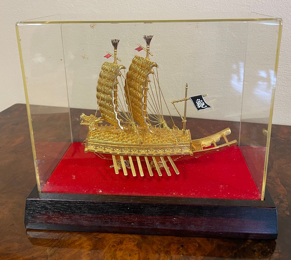 Lot 345 – A 24K Gold-Plated Commemorative Model of a Korean Turtle Ship Geobukseon by Samsung