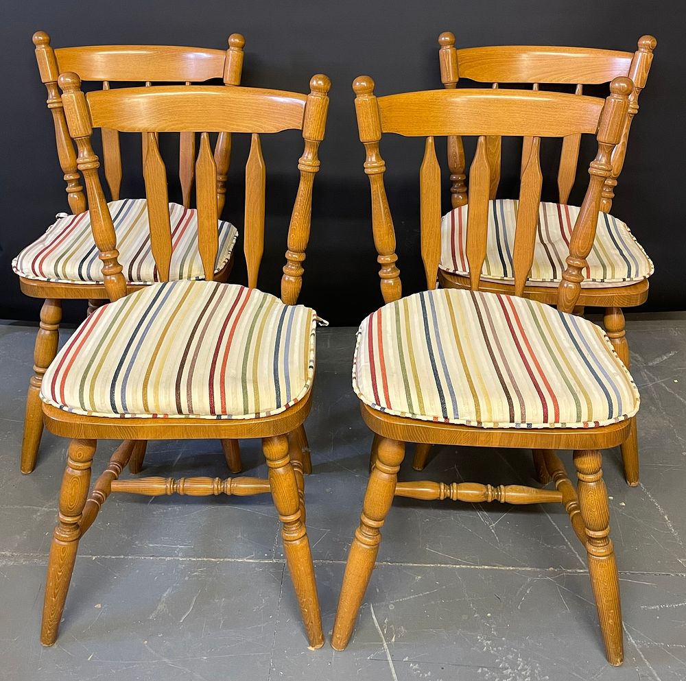 Lot 243 – Four sturdy pine kitchen chairs with cushions