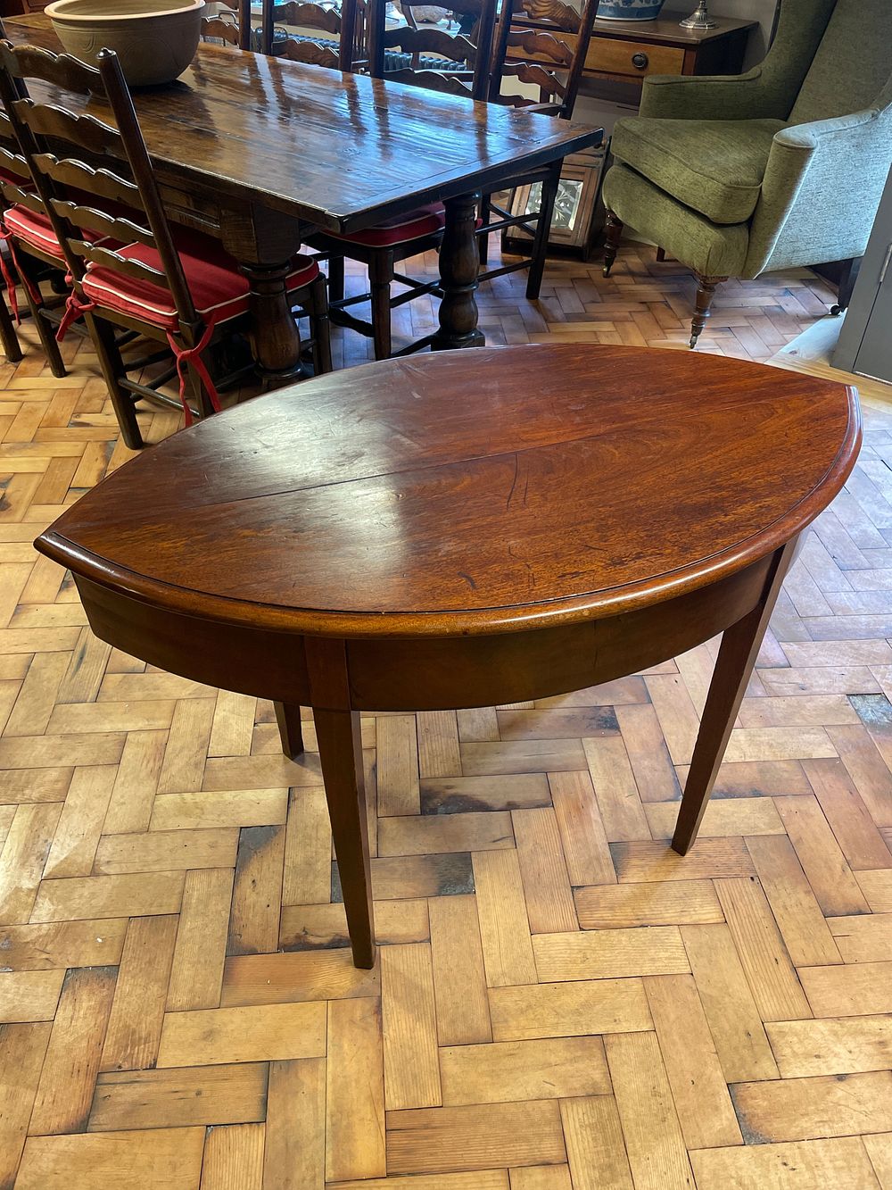 Lot 246 – An Unusual English 19th Century Mahogany Oval Tea Table