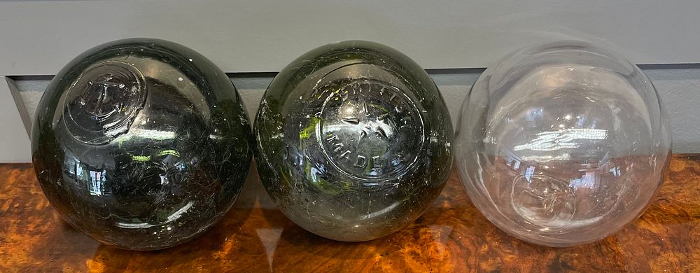 Lot 266 – A Trio of Vintage Hand-Blown Glass Fishing Floats