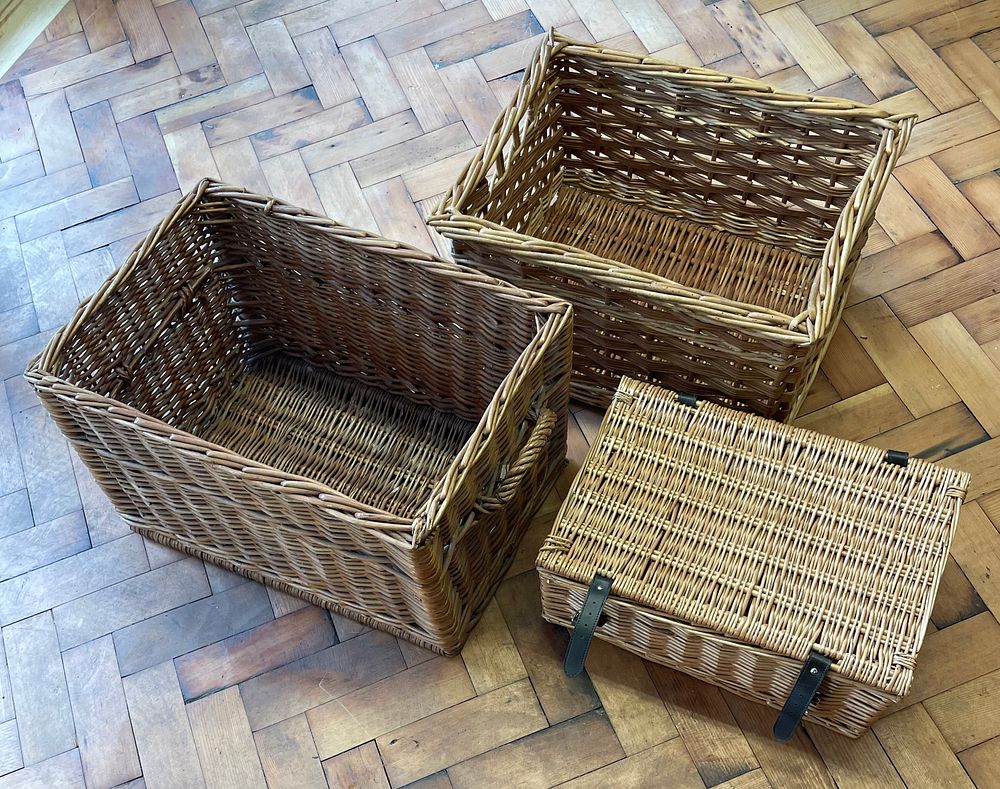 Lot 172 – A Trio of Woven Wicker Storage Baskets and Hamper