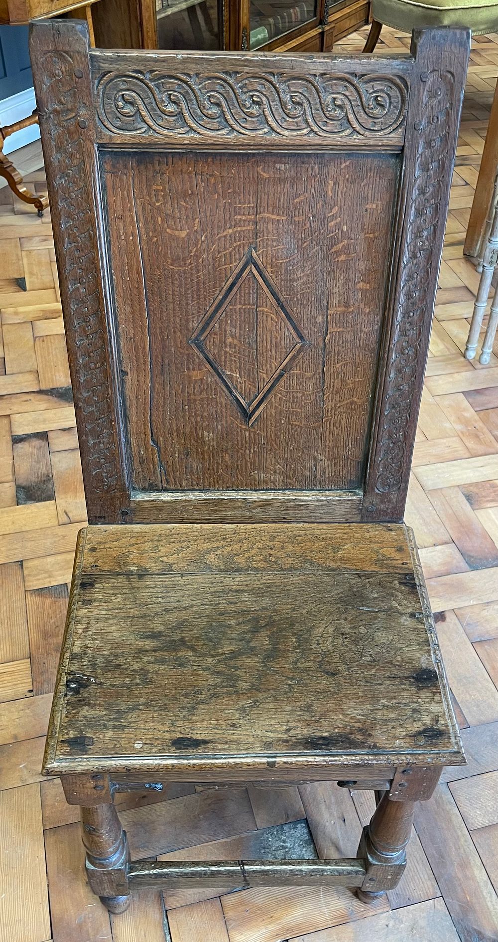 Lot 249 – Jacobean Style Carved Oak Panel Back Side Chair