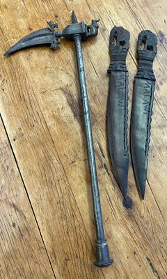 A Trio of Ethnographic Weapons Including a Zaghnal Style Battle Axe and Two Carved Malawi Knives. 