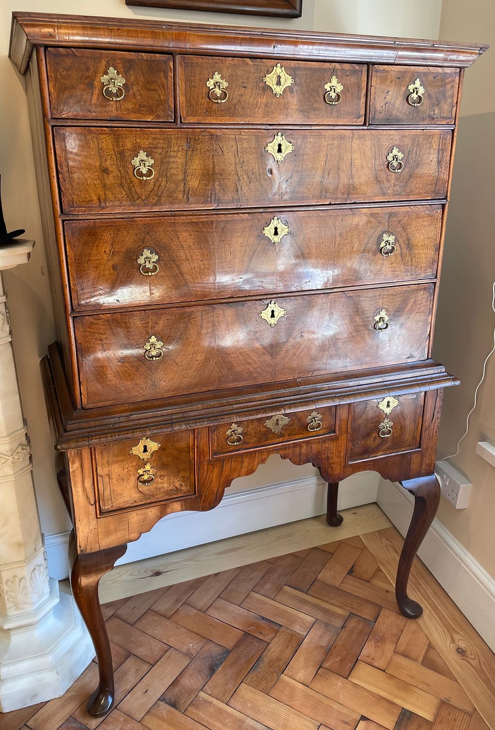 Lot 253 – Queen Anne (1702 – 1714) Figured Walnut Chest on Stand with Inlaid Compass Star