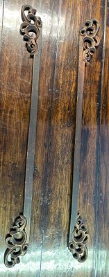 A Pair of Chinese Carved Wood Silk/ Scroll Hangers. A pair of long, slender wooden decorative 