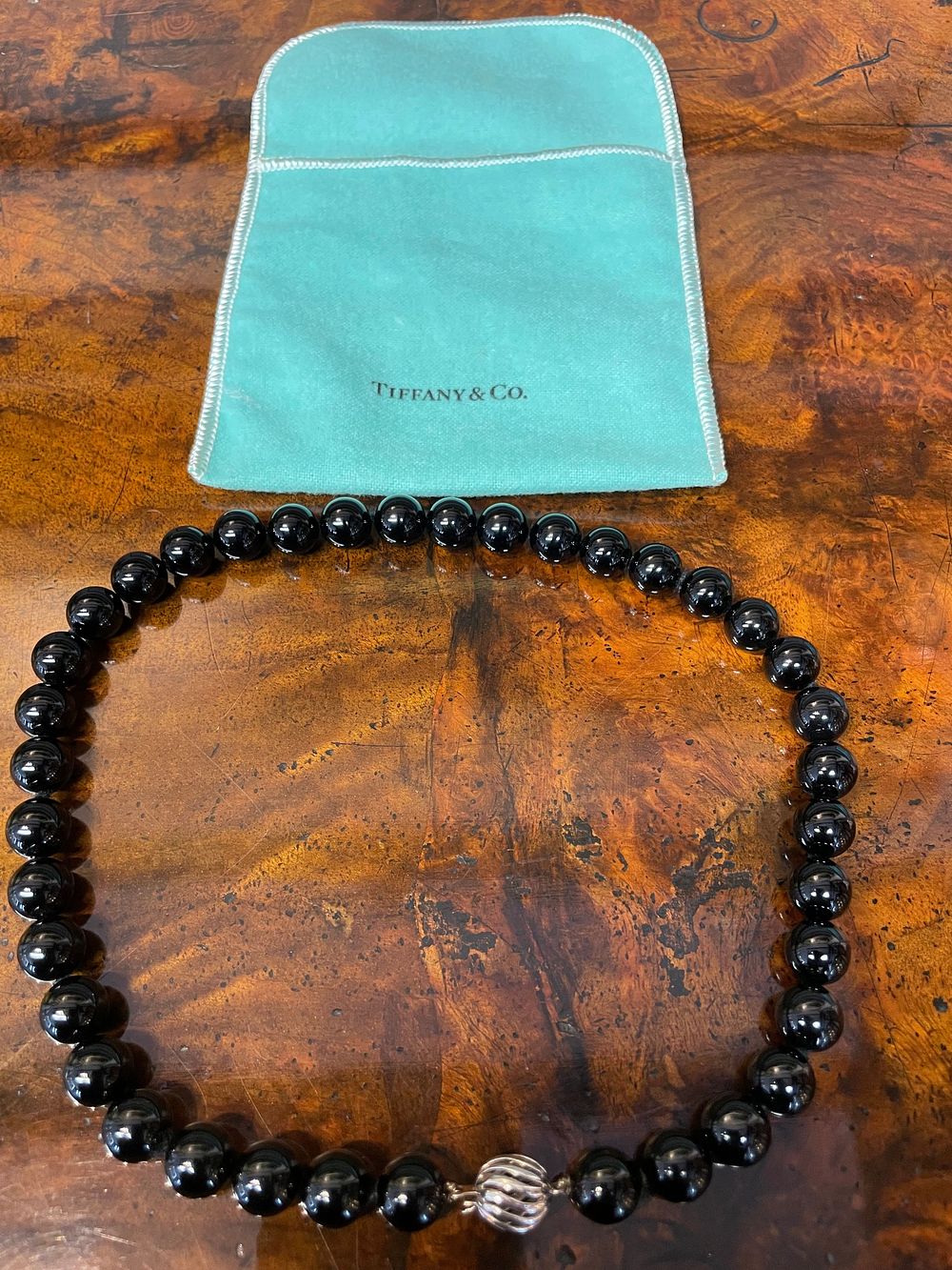 Lot 138a – A Black Onyx Bead Necklace By Tiffany and Co with Pouch