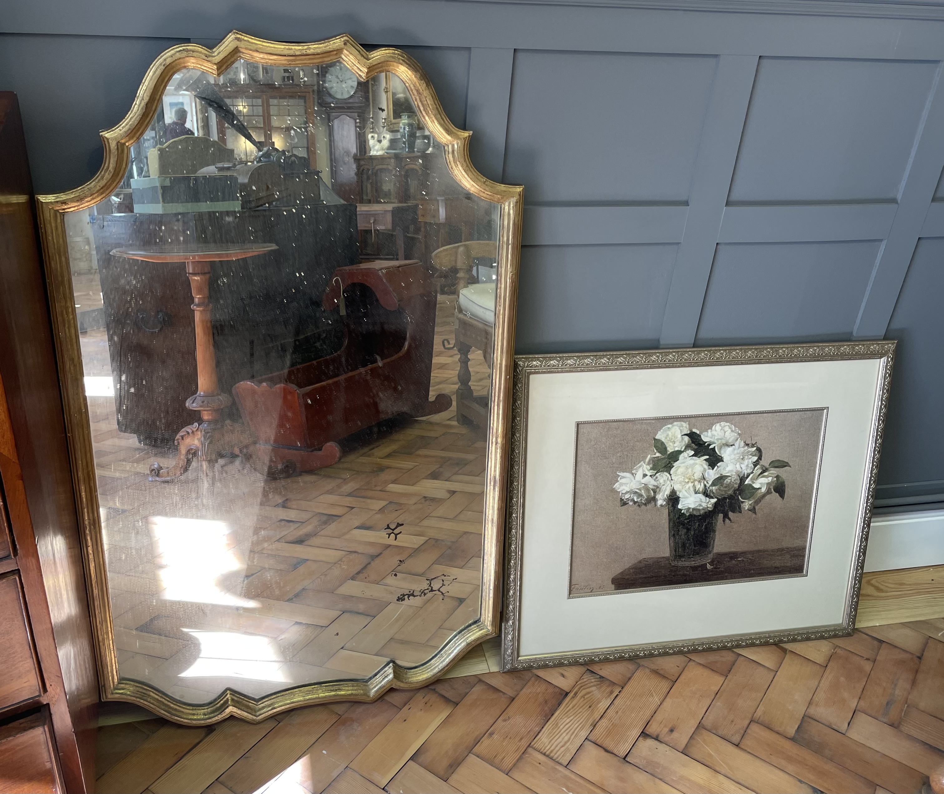 A Giltwood Wall Mirror and a Framed Still Life Print after Henri Fantin-Latour
